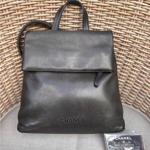 Authentic CHANEL black calf skin backpack